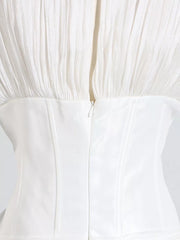 White ruffled mini dress with balloon sleeves, featuring a zipper closure and corset bodice detail.