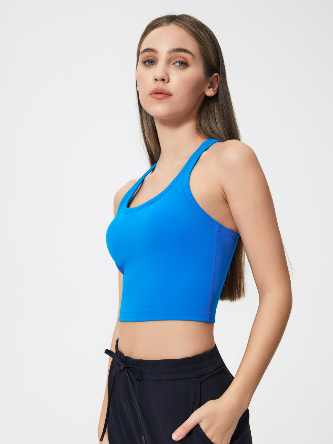 Sculpted racerback crop tank in Royal Blue with a scoop neckline.