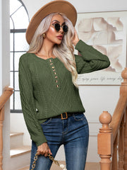 Cable knit henley sweater in matcha green with button detail and diamond pattern.