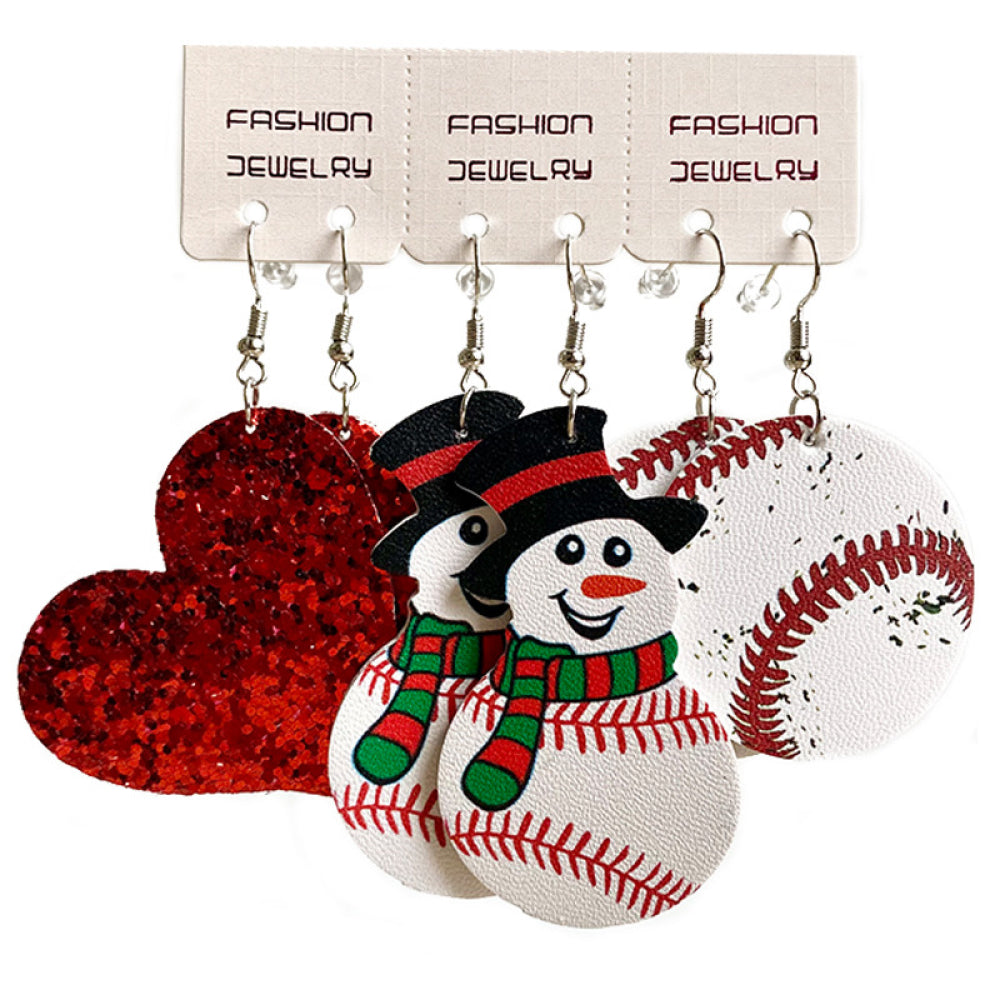 Festive sports trio earrings set with glitter heart, snowman, and baseball designs.