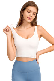 White sculpted scoop neck crop top with a smooth finish.