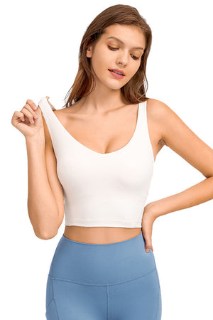 White sculpted scoop neck crop top with a smooth finish.