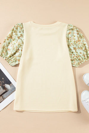 Beige ribbed knit top with floral puff sleeves