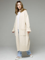Cream oversized ribbed-trim maxi cardigan with pockets and cuffed sleeves.