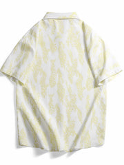 Cotton button-up shirt in white with abstract neon yellow pattern.