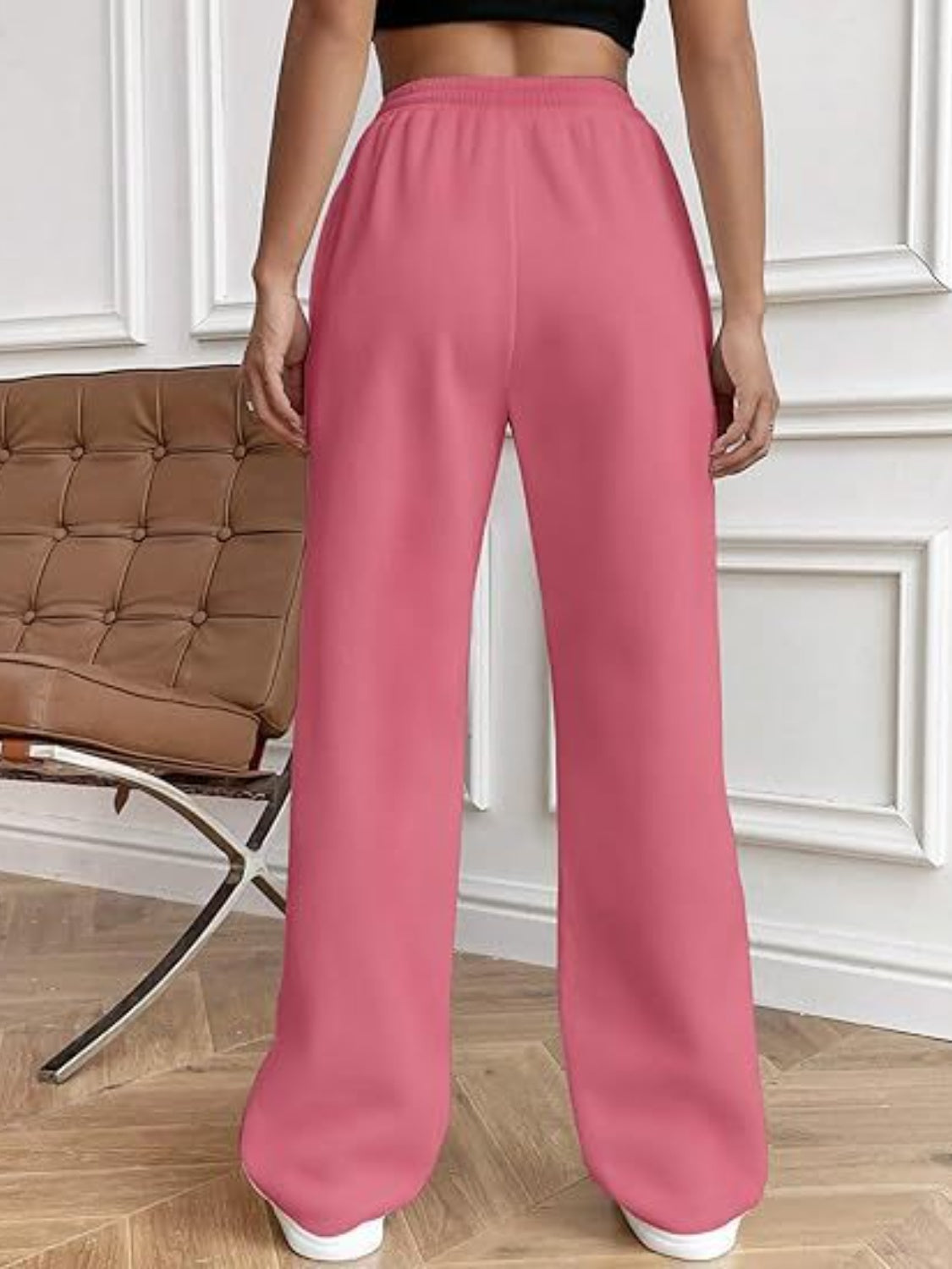Deep Rose wide-leg lounge trousers with elastic waist and relaxed fit.