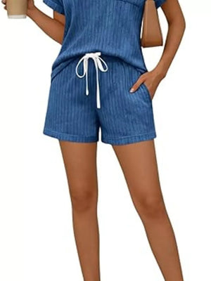 Blue ribbed knit loungewear shorts with drawstring waist and pockets.