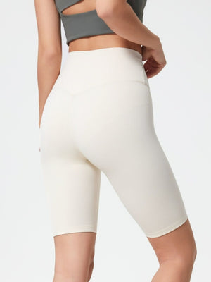 Sculpted Contour Active Cycling Shorts in White with a high waist and V-seam detail.