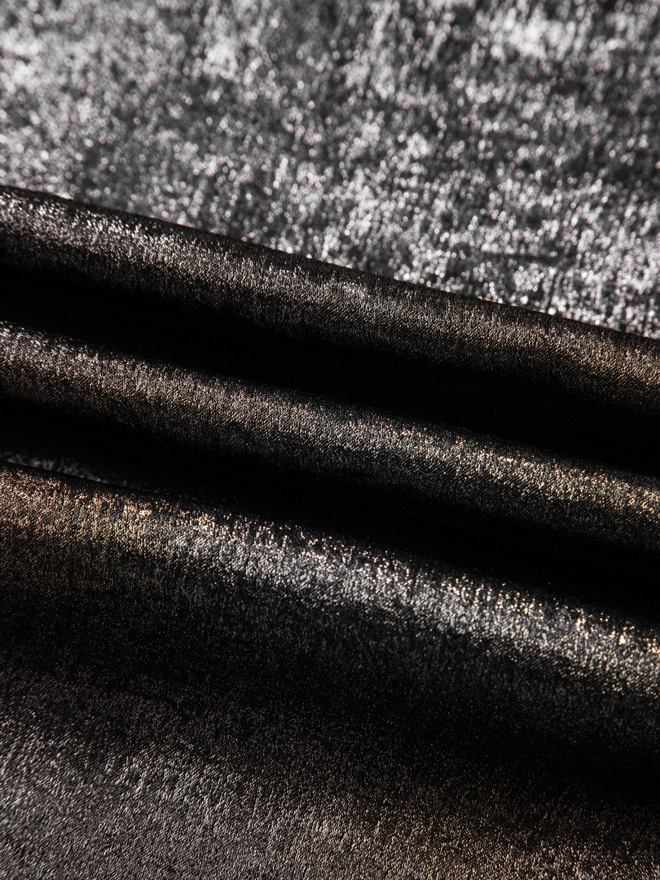 Elegant ruffled neck tank top in silver or gold metallic fabric with a textured sheen.