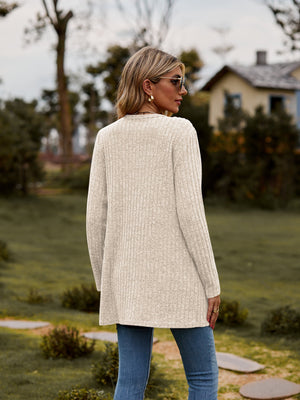 Longline ribbed knit button-down cardigan in beige with a relaxed fit.