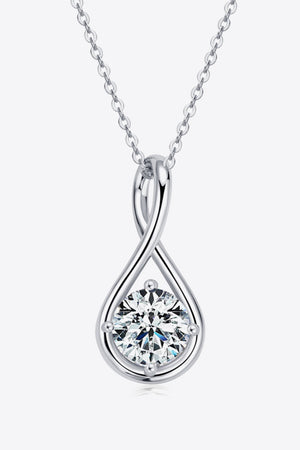 Silver infinity teardrop pendant necklace with a round-cut crystal.