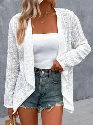 White eyelet embroidered open front cardigan with a relaxed fit and delicate detail.