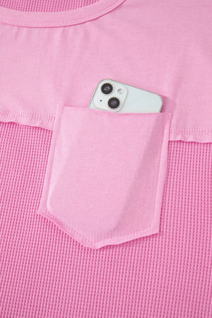Pink waffled seam pocketed t-shirt with phone in pocket