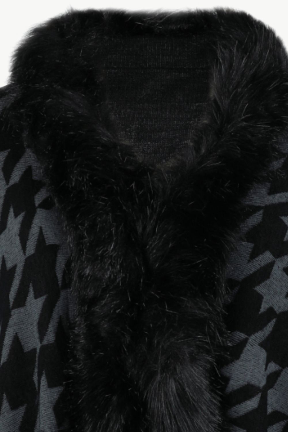 Houndstooth faux fur collar poncho in black with a grey houndstooth pattern.