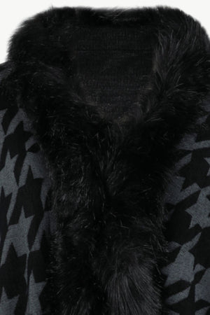 Houndstooth faux fur collar poncho in black with a grey houndstooth pattern.