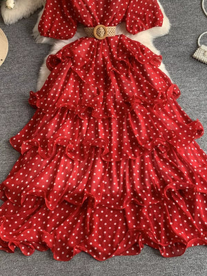 Red polka dot tiered ruffle dress with a woven belt