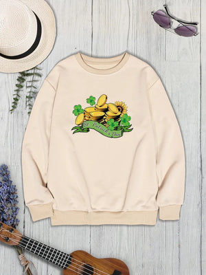Khaki St. Patrick's Day graphic sweatshirt with shamrocks and gold coins.