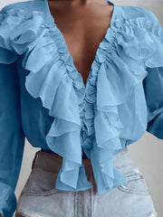 Sky blue chiffon blouse with cascading ruffles and plunging neckline