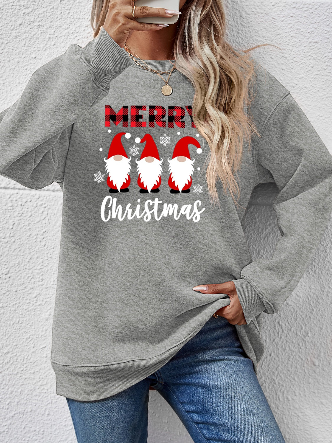 Gray Christmas gnome graphic sweatshirt with red plaid Merry text and snowflakes.