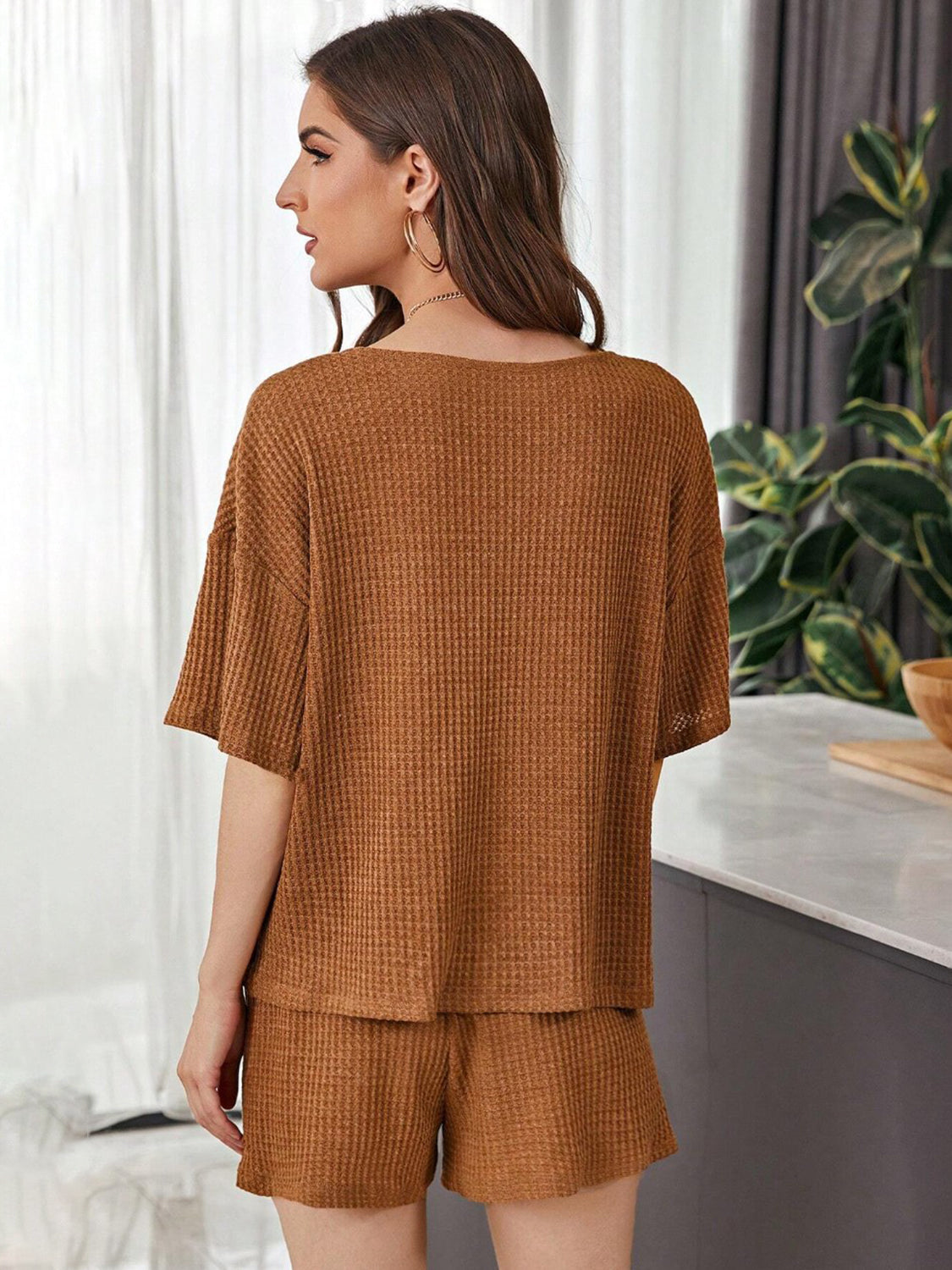 Relaxed waffle knit henley short set in caramel with short sleeves and elastic waist shorts.