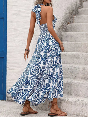 Blue and white medallion print halter maxi dress with smocked waist and tie back.