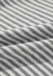Gray and white geometric stripe knit sweater with a textured weave.