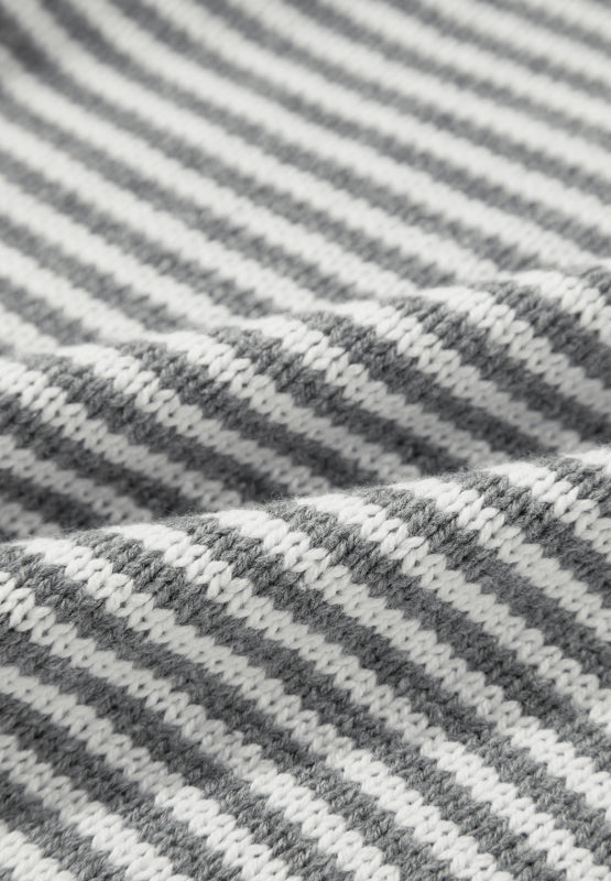 Gray and white geometric stripe knit sweater with a textured weave.