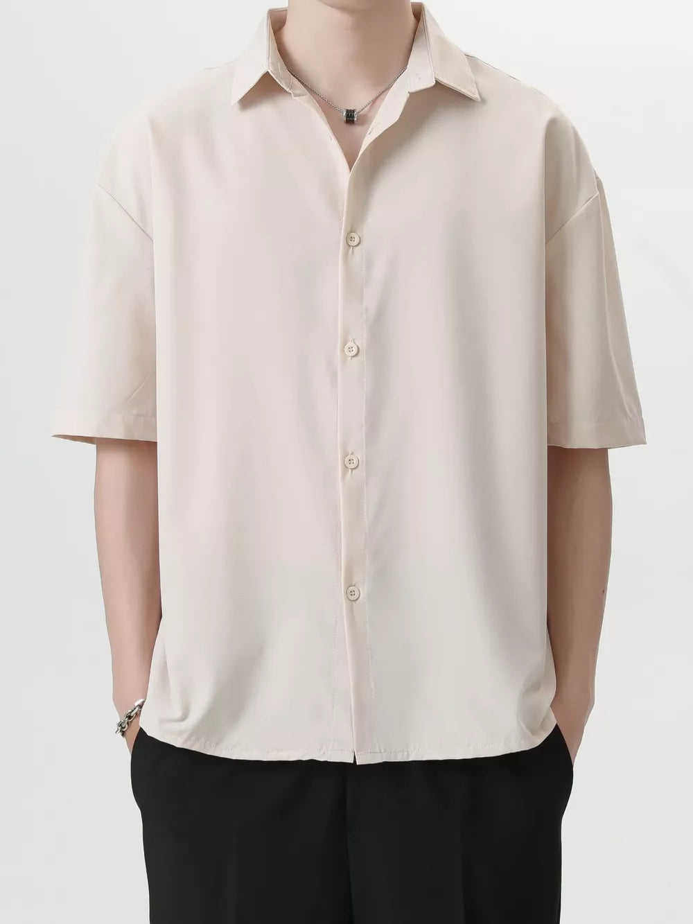 Men's Apricot short sleeve button-down shirt with spread collar.