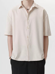 Men's Apricot short sleeve button-down shirt with spread collar.