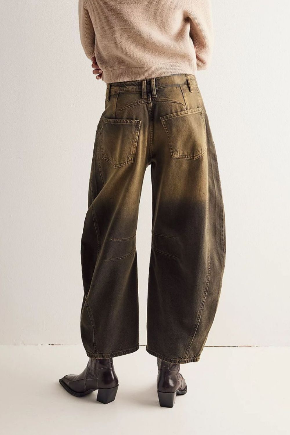 Sculpted denim barrel leg jeans in olive brown with gradient wash and paneled detail.