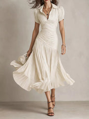 Elegant beige ruched midi dress with pleated skirt and collared neckline