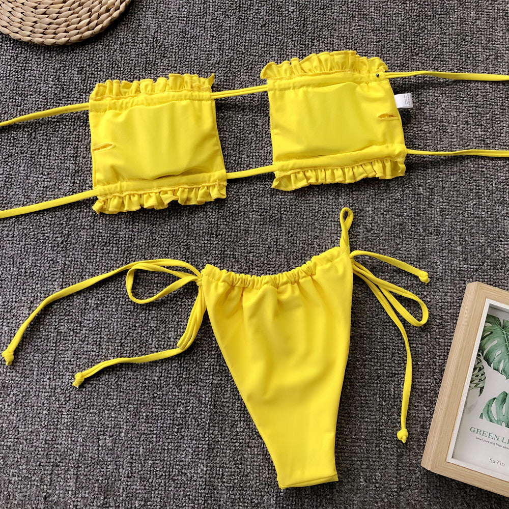 Yellow bandeau bikini set with ruffle trim and tie sides.