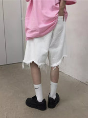 Men's Full Size Raw Hem Shorts in White, model styling view