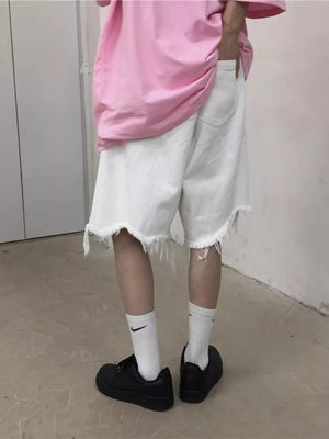 Men's Full Size Raw Hem Shorts in White, model styling view