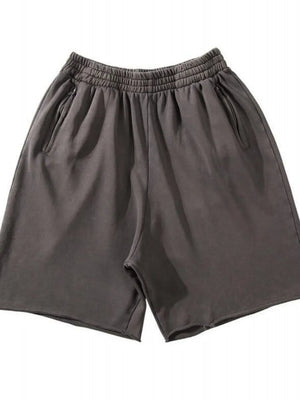 Gray relaxed fit shorts with raw hem and zippered pockets