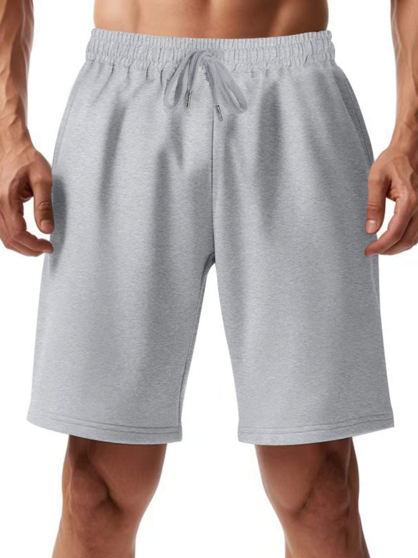 Light gray chino shorts with drawstring waist and pockets on a man.