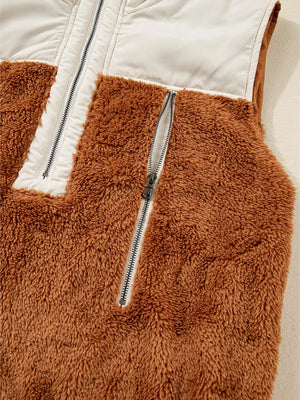 Cozy color block vest coat in brown and beige fuzzy fleece with a zippered front pocket and white panel.