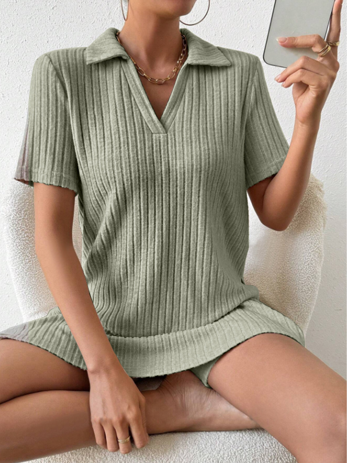 Sage ribbed polo shirt and shorts set with a v-neck and collar detail.