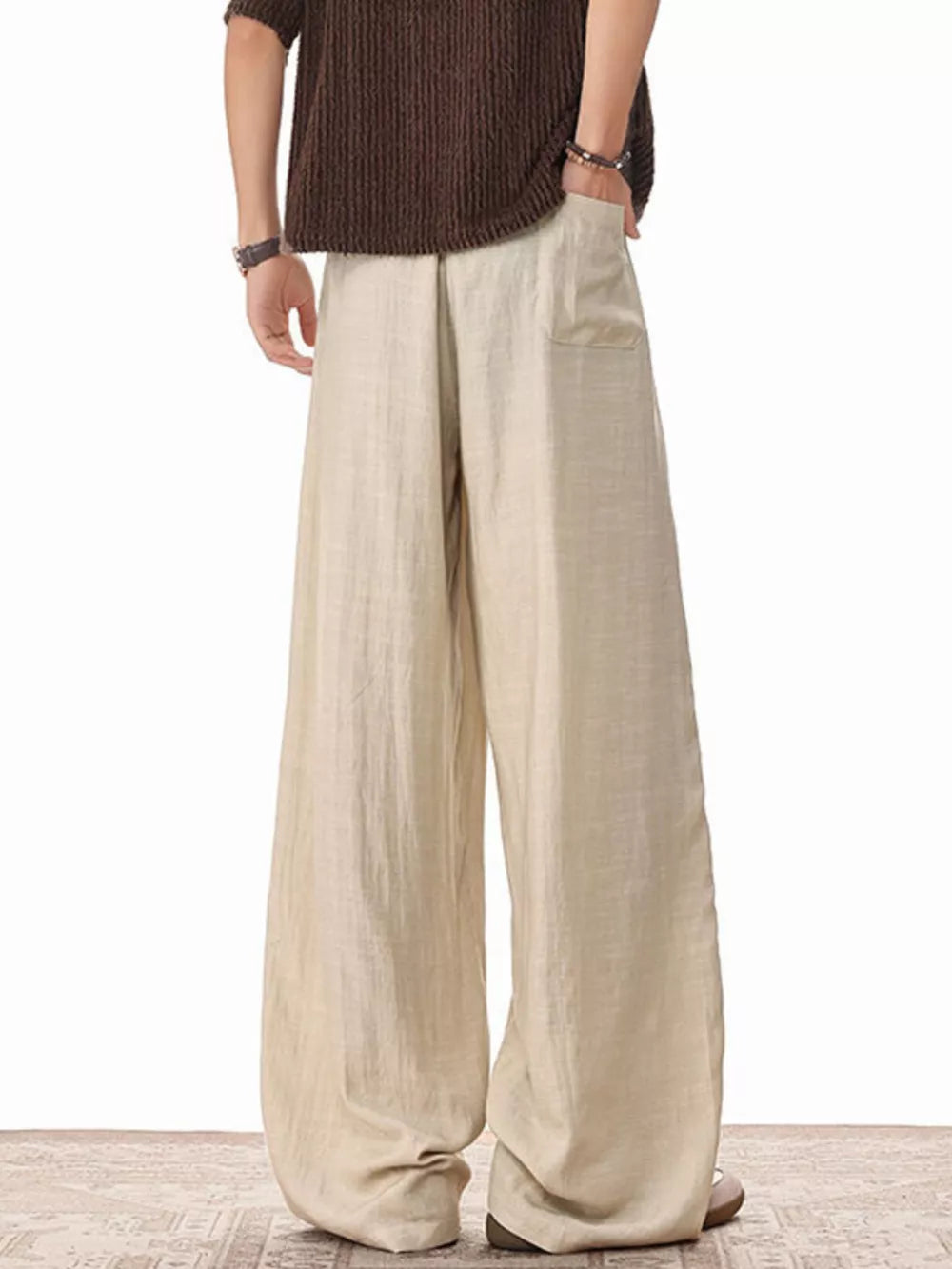 Relaxed fit khaki drawstring sweatpants with pockets.