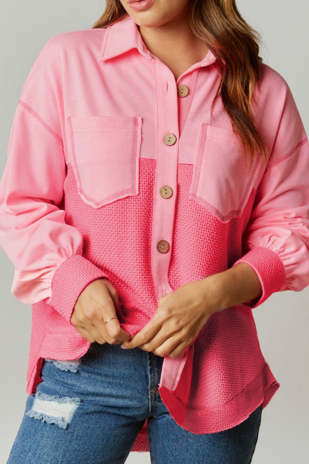 Blush pink waffle knit panel shacket with button front and chest pockets.