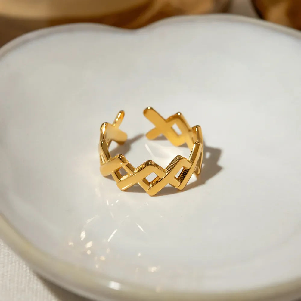 Gold openwork ring with geometric cutout pattern, 18K gold-plated, adjustable for women.
