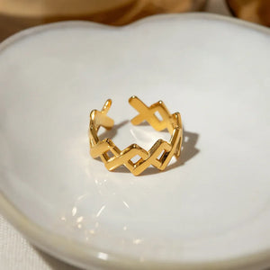 Gold openwork ring with geometric cutout pattern, 18K gold-plated, adjustable for women.