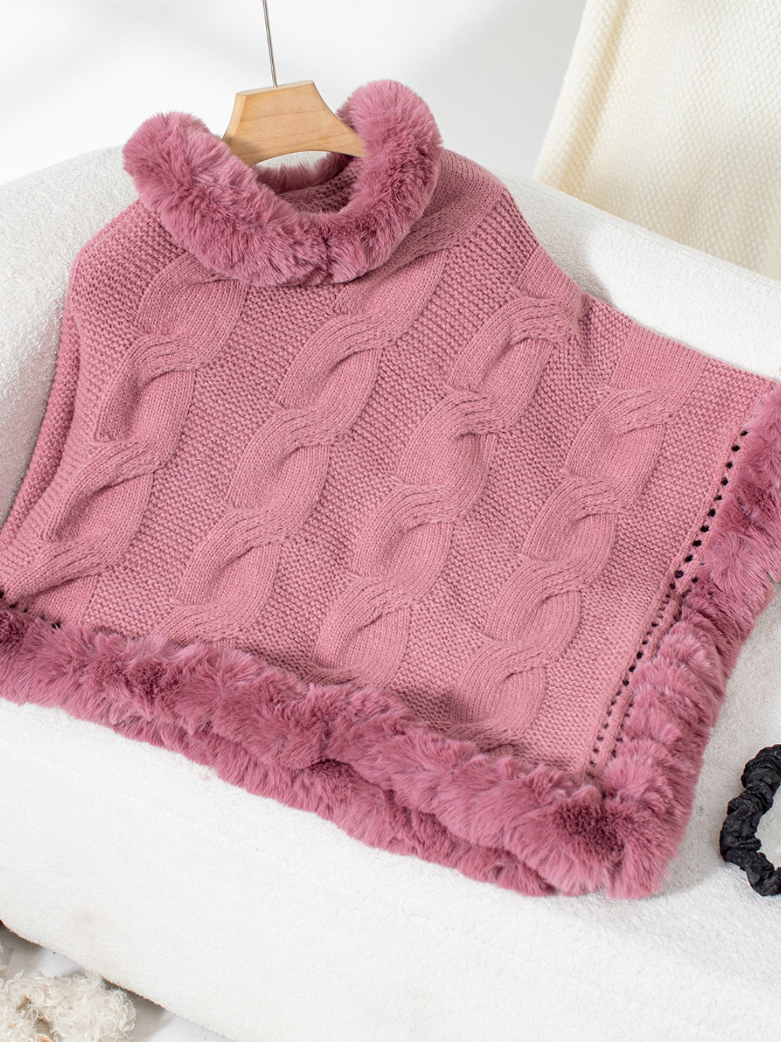 Dusty Pink cable knit poncho with faux fur trim and cowl neck.