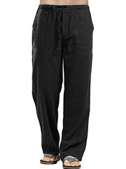Black linen drawstring trousers with a relaxed fit and side pockets.