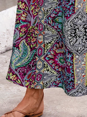 Paisley print maxi skirt with slit in Deep Purple, Yellow-Green and Styl A colors.