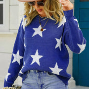 Cobalt blue acrylic crewneck sweater with white stars, long sleeves.