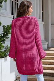 Hot Pink textured knit cocoon cardigan with balloon sleeves.