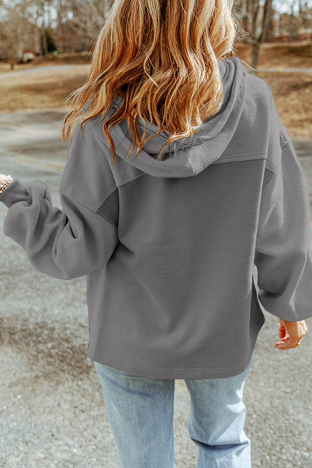 Textured utility hoodie jacket in gray with contrast panel and hood.