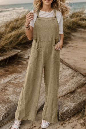 Textured cotton overalls in camel with square pockets and wide legs.