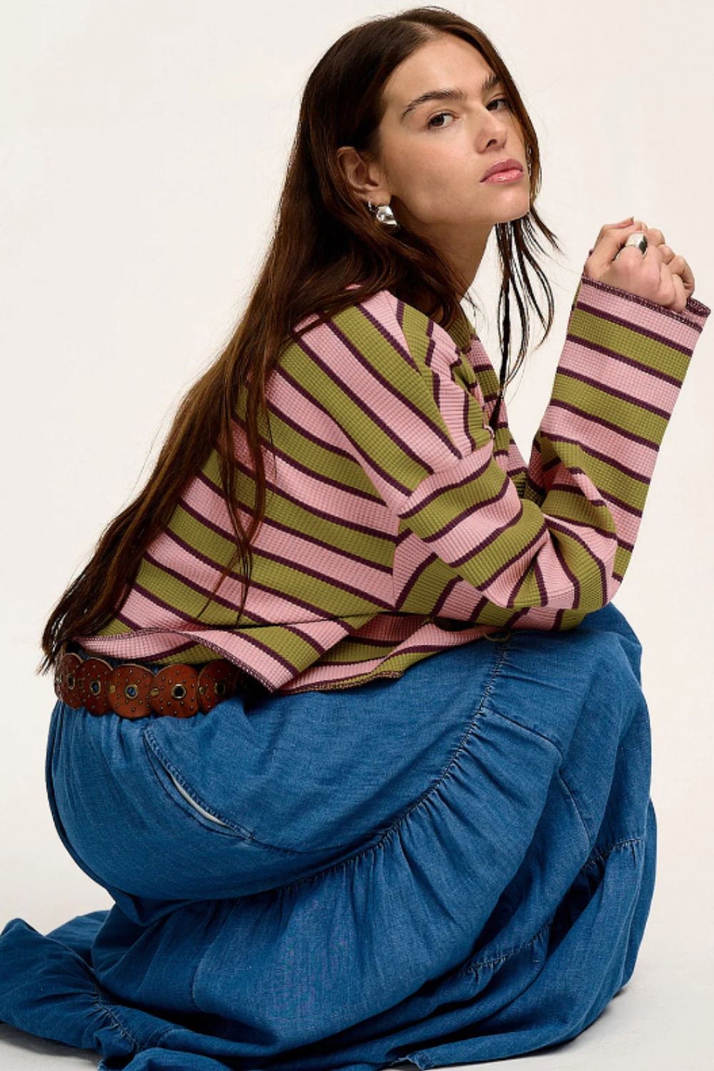 Waffle knit cropped top with pink and green stripes and V-neck.